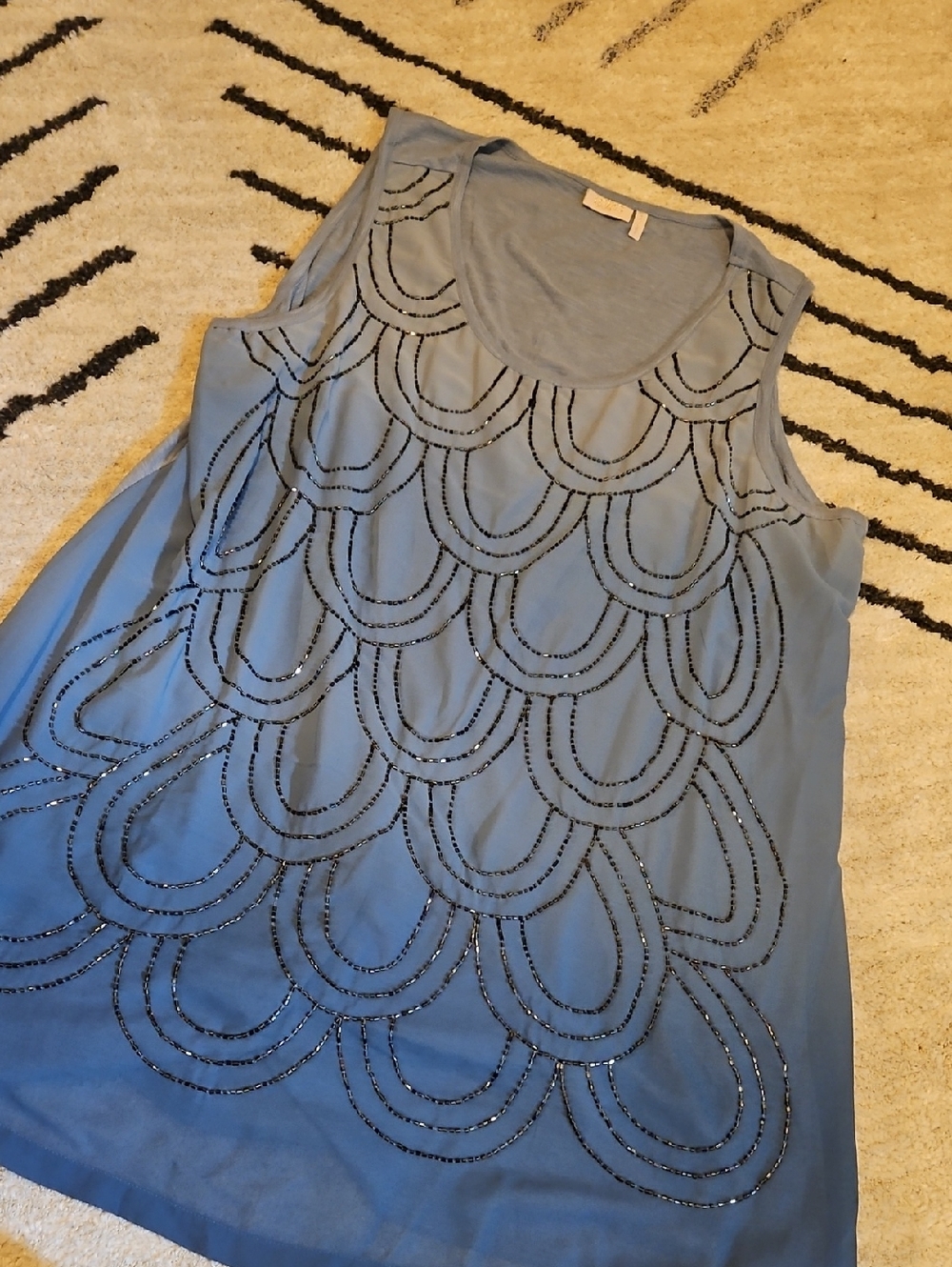 Lavish Light Blue Sleeveless Top with Subtle Scoop